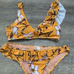 Floral, ruffled bathing suit.